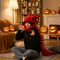 Person wearing the red dragon plush head hood